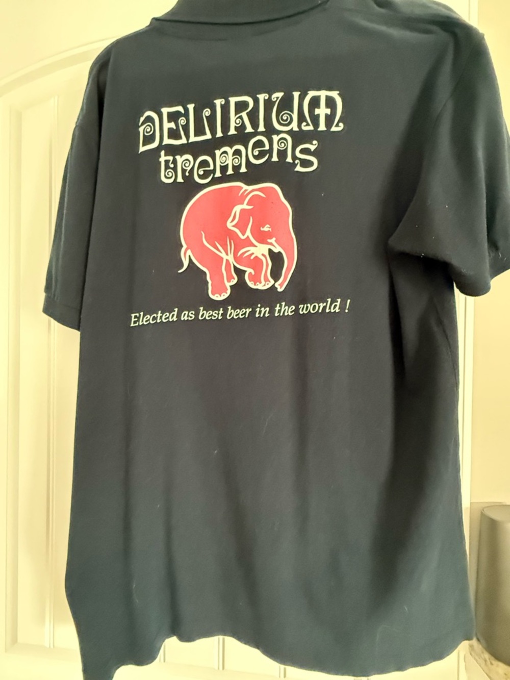 Delirium Tremens Women’s Navy Polo Blouse with pink elephant Emblem XL